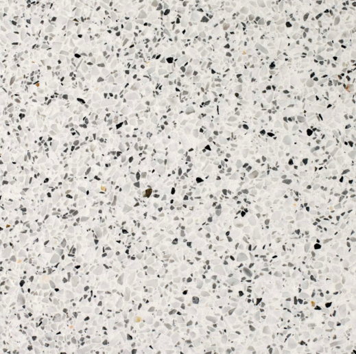 Carrelage Terrazzo Gris Poivré au fond gris clair, ponctué de fines inclusions noires et blanches, pour revêtement de sol et mur.
