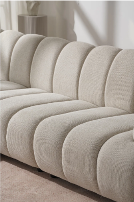Détail du tissu polyester du canapé montrant la qualité et la texture