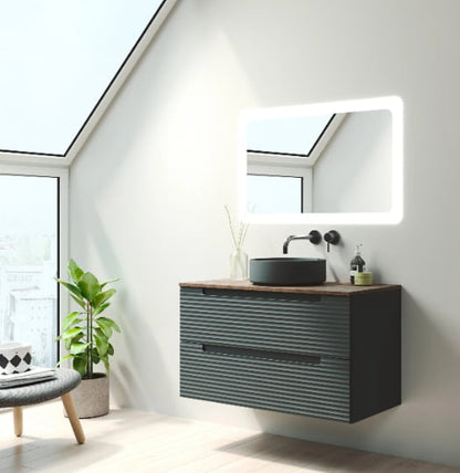 Meuble de salle de bain suspendu en vert foncé, vue de trois-quarts