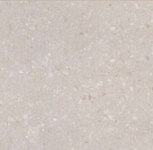 Carrelage Terrazzo Beige Méditerranée au fond beige clair uniforme, ponctué de fins granulats minéraux, pour revêtement de sol et mur.