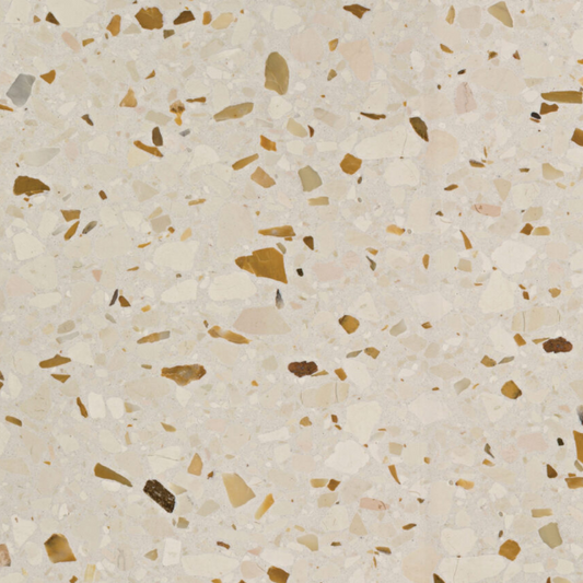 Carrelage Terrazzo Ivoire Ocré au fond clair et neutre, ponctué de granulats de marbre de taille moyenne dans des nuances chaudes de beige et d'ocre.