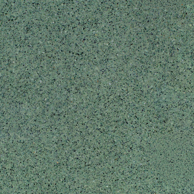 Carrelage microterrazzo Vert Jade au fond vert vif, composé de microgranules vert foncé et gris, avec un aspect fin, homogène et subtilement nuancé.