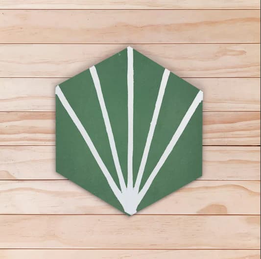 Carreau de ciment hexagonal vert avec des lignes blanches partant d’un même point