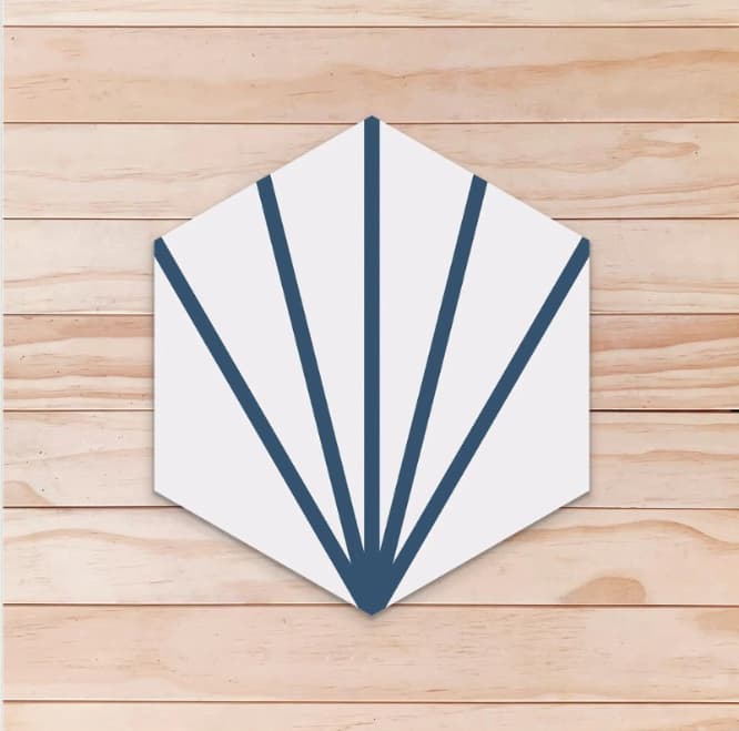 Carreau de ciment hexagonal à fond blanc avec des traits bleu foncé partant d’un même point