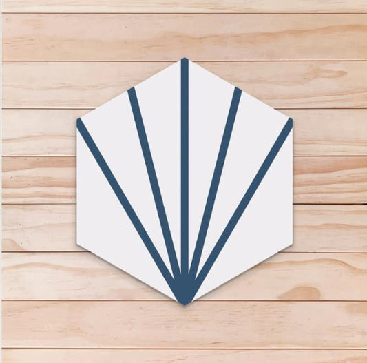 Carreau de ciment hexagonal à fond blanc avec des traits bleu foncé partant d’un même point