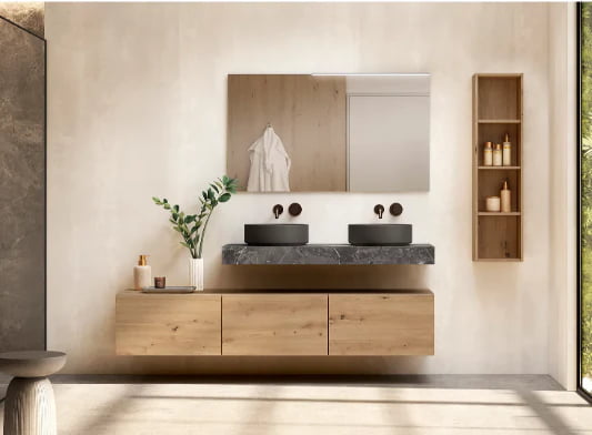 Meuble de salle de bain suspendu avec deux meubles asymétriques, un supérieur en pierre et un inférieur en bois clair avec rangements